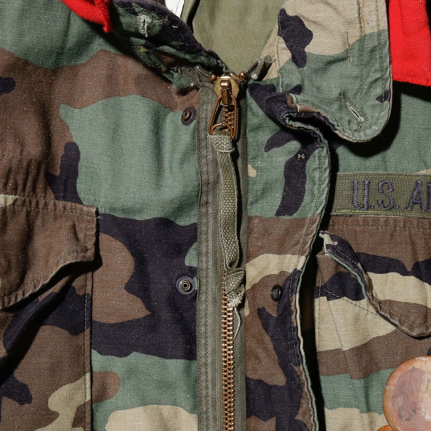 *one-off cropped field jacket , with hoodie/kapper badge