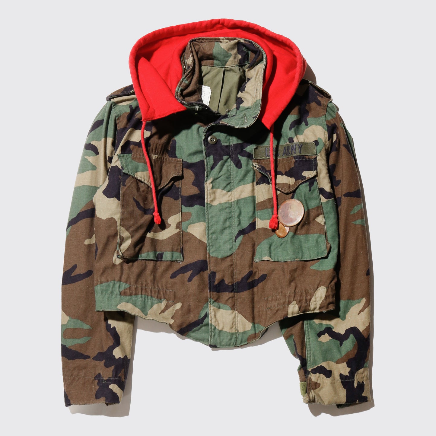 *one-off cropped field jacket , with hoodie/kapper badge