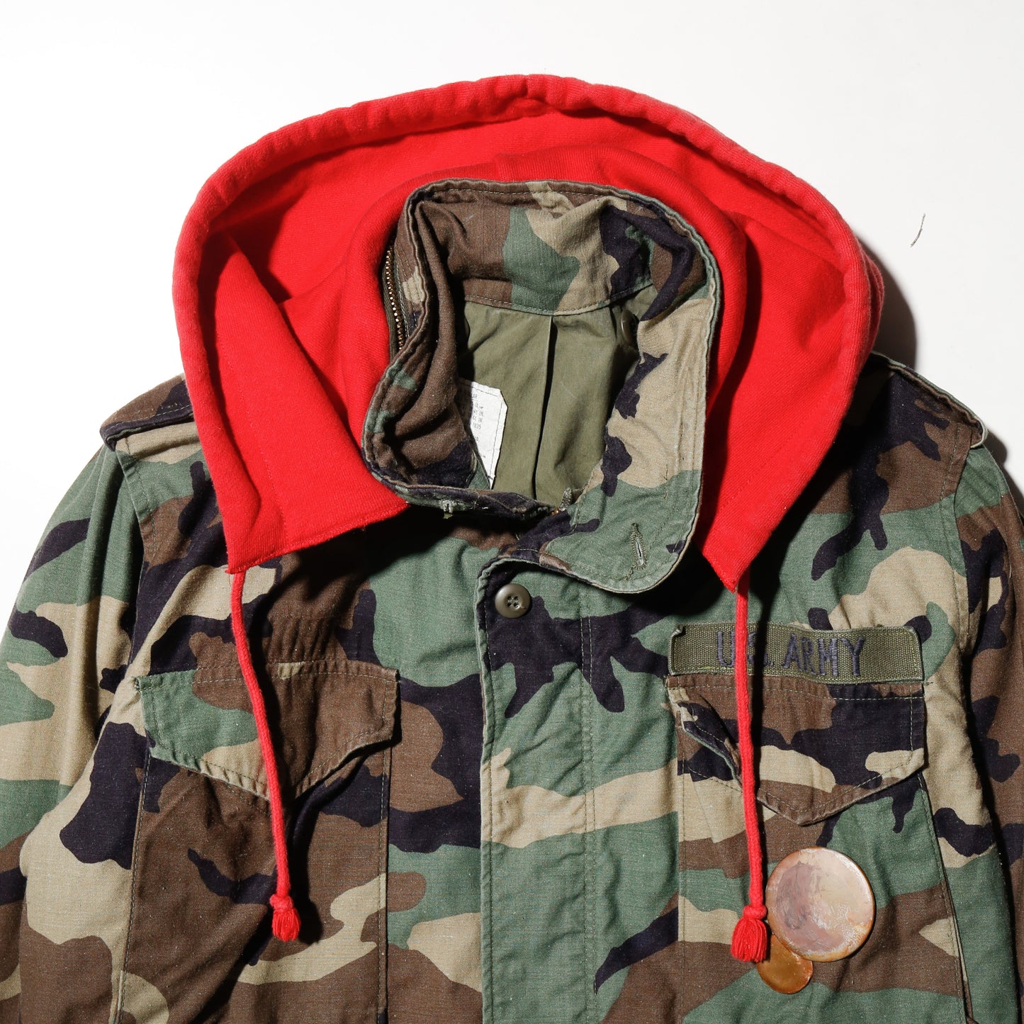 *one-off cropped field jacket , with hoodie/kapper badge