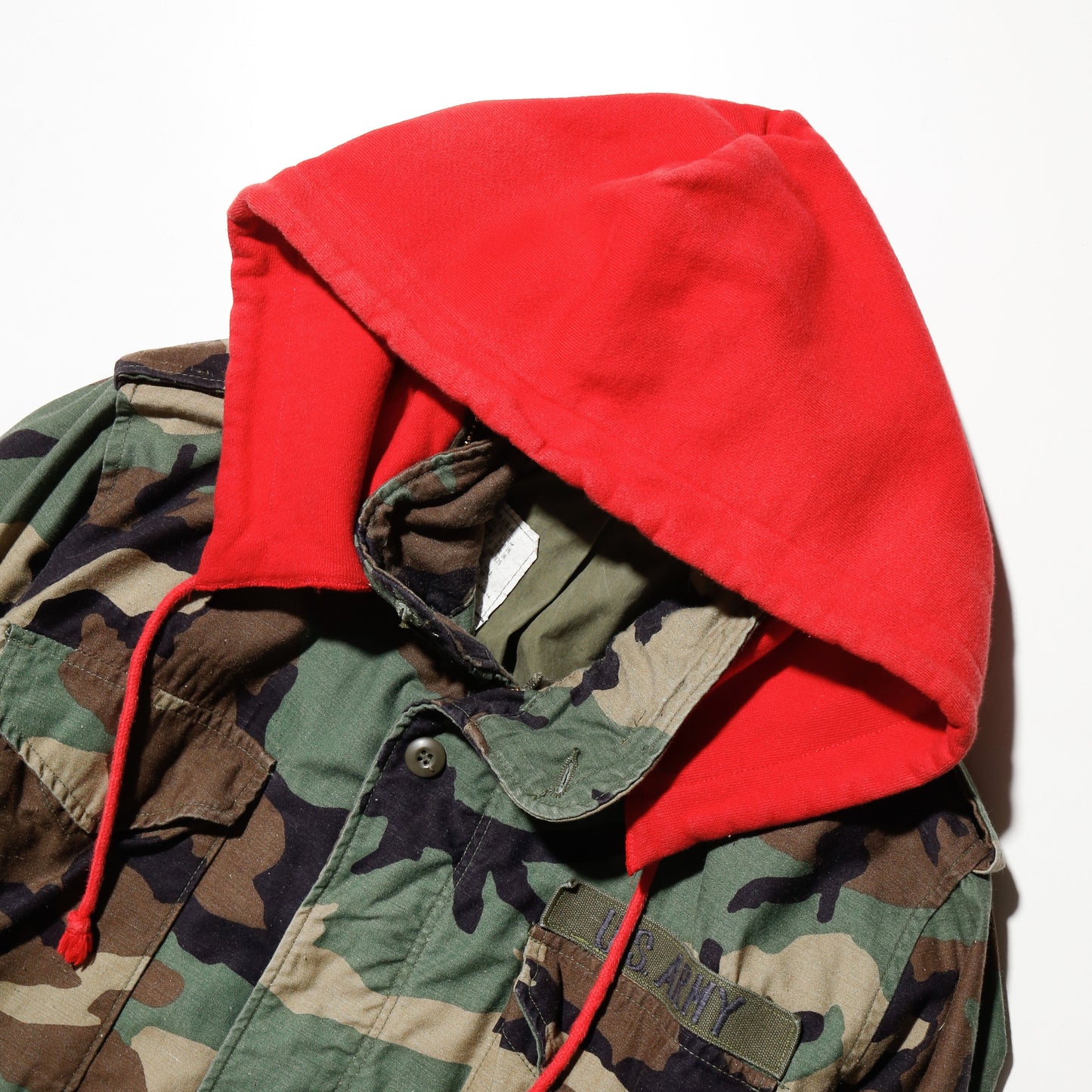 *one-off cropped field jacket , with hoodie/kapper badge