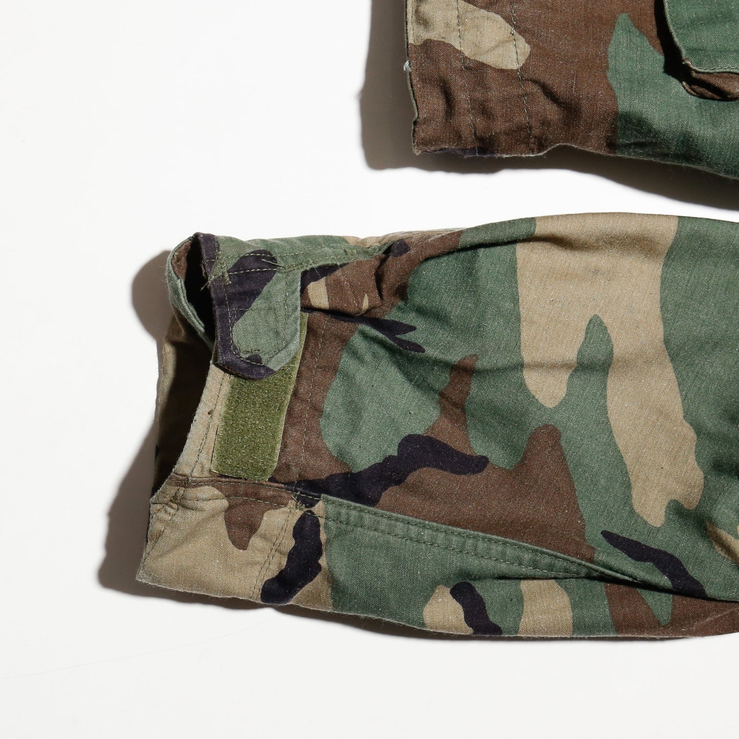 *one-off cropped field jacket , with hoodie/kapper badge