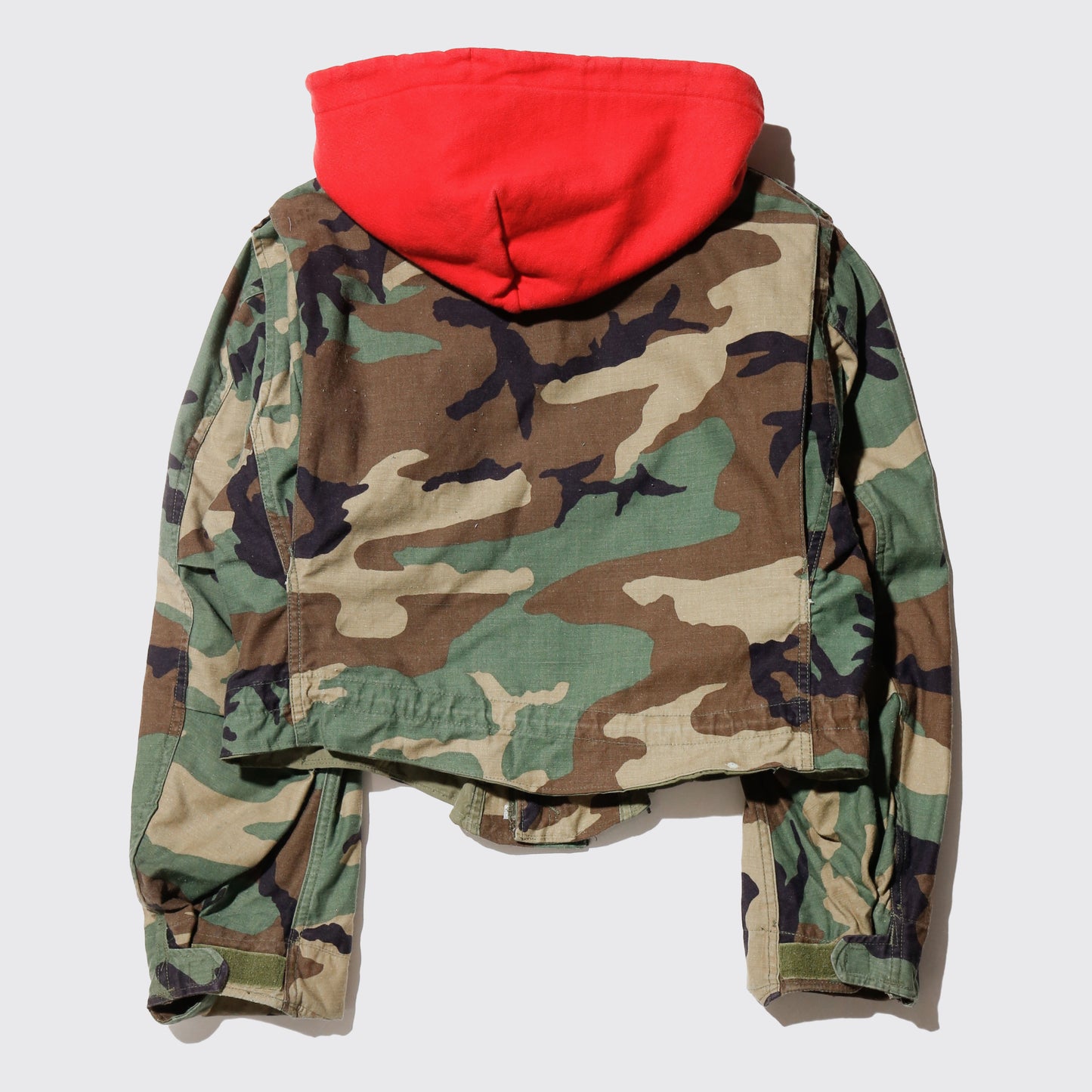 *one-off cropped field jacket , with hoodie/kapper badge
