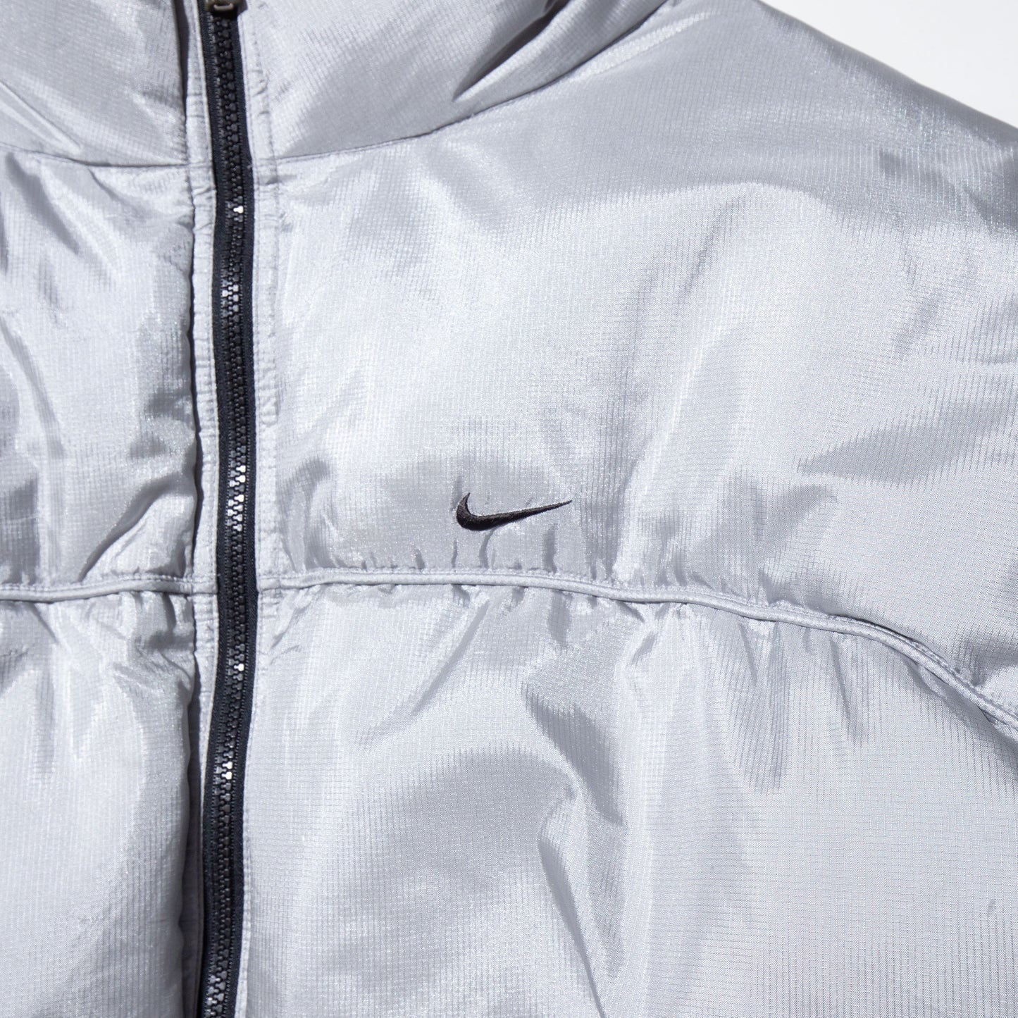 vintage 00's nike silver down jacket