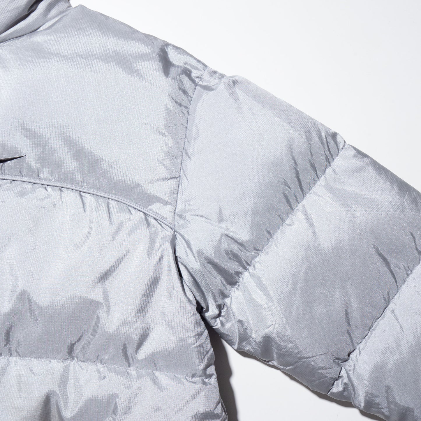 vintage 00's nike silver down jacket