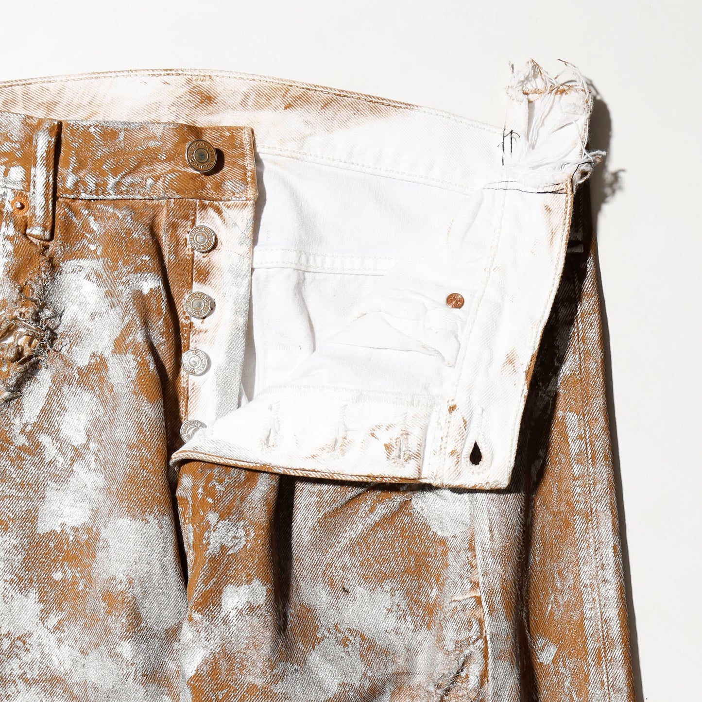 *one-off broken upside down jeans: model- silver dust camel