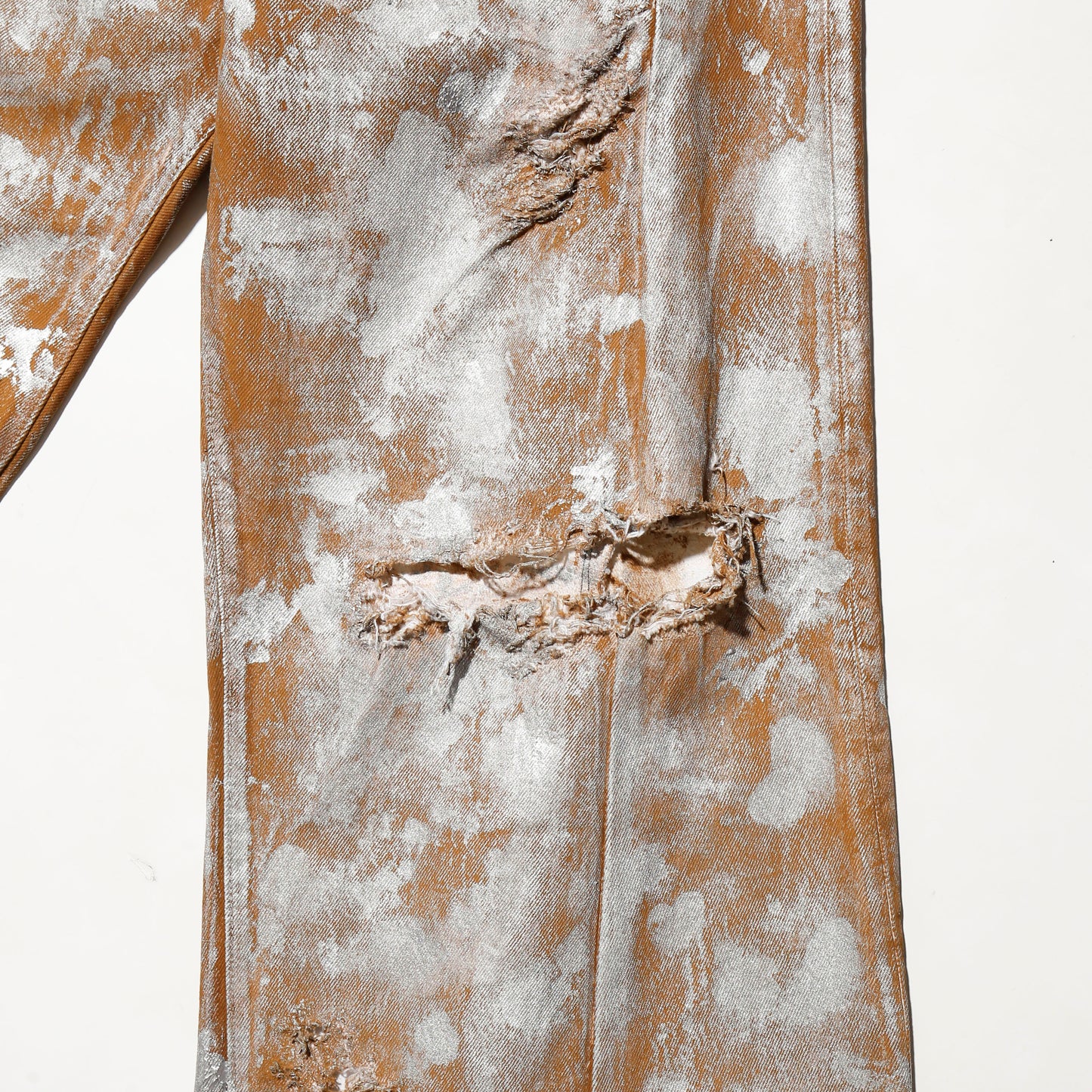 *one-off broken upside down jeans: model- silver dust camel