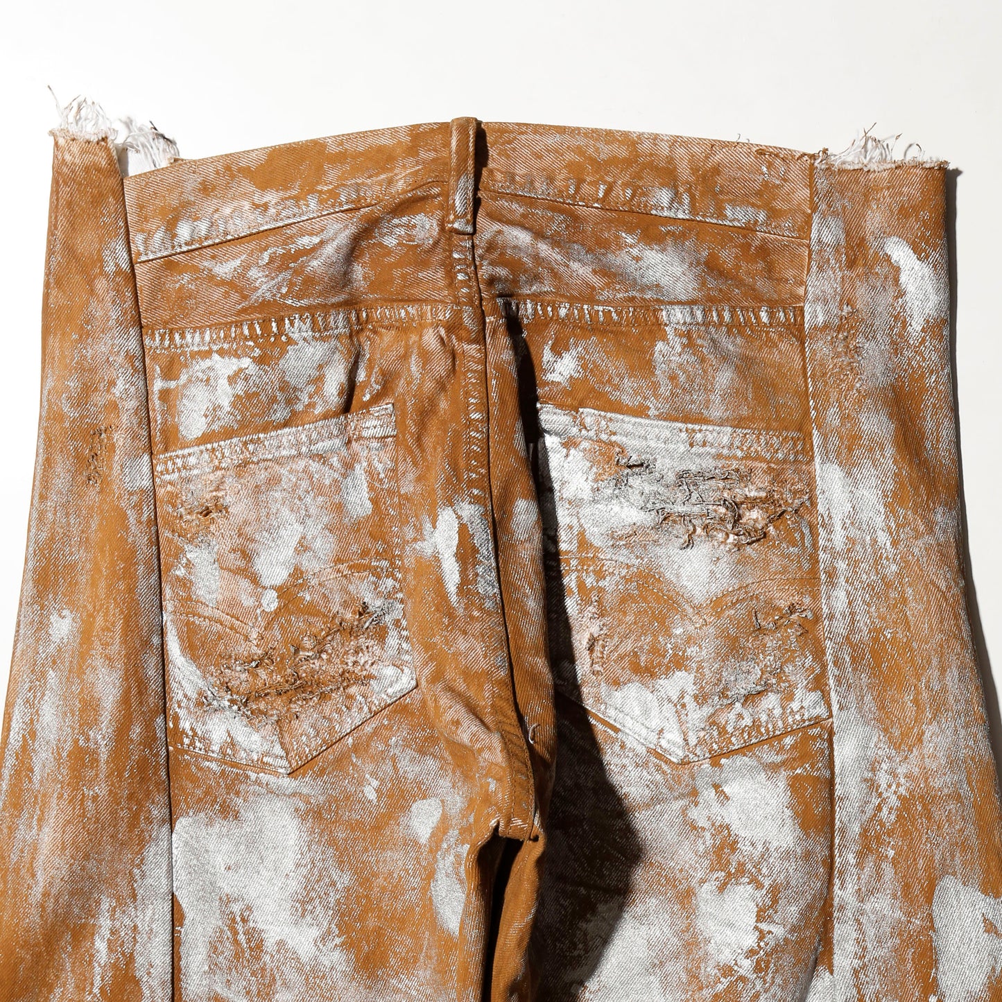 *one-off broken upside down jeans: model- silver dust camel