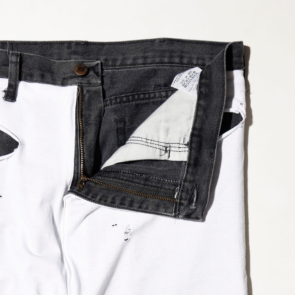*one-off broken layered trousers