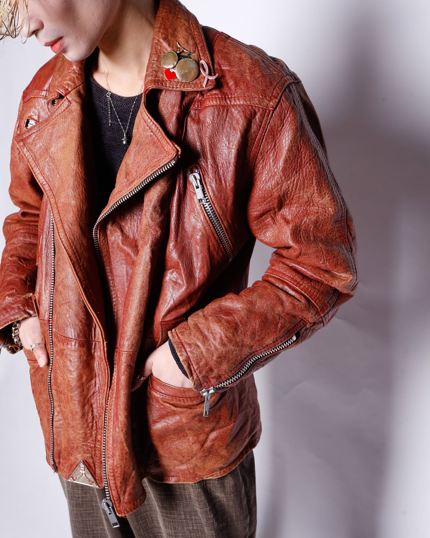 vintage reddish leather riders jacket , with badge