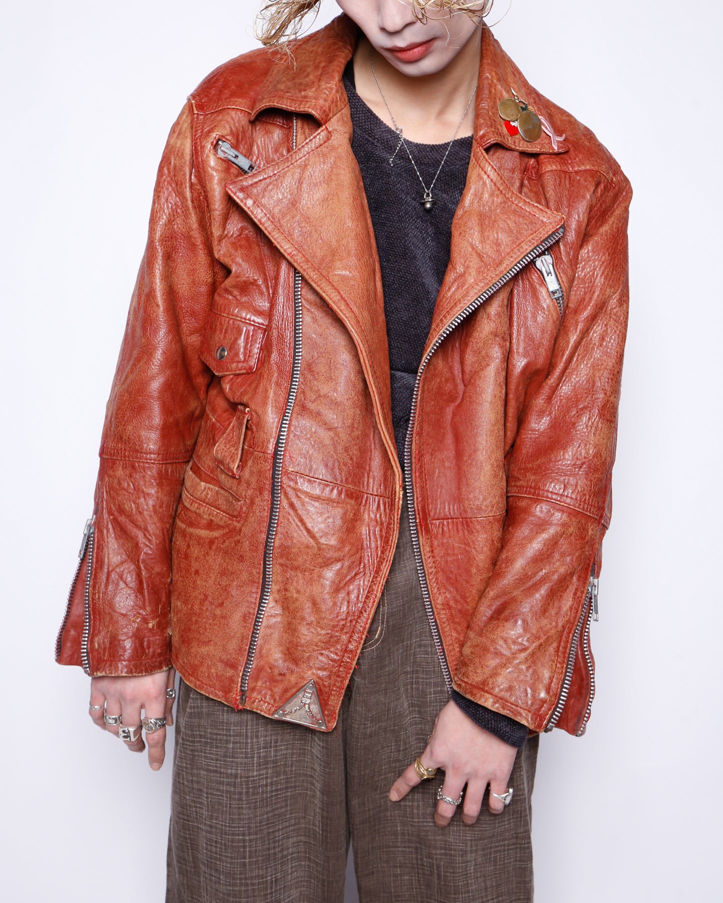 vintage reddish leather riders jacket , with badge