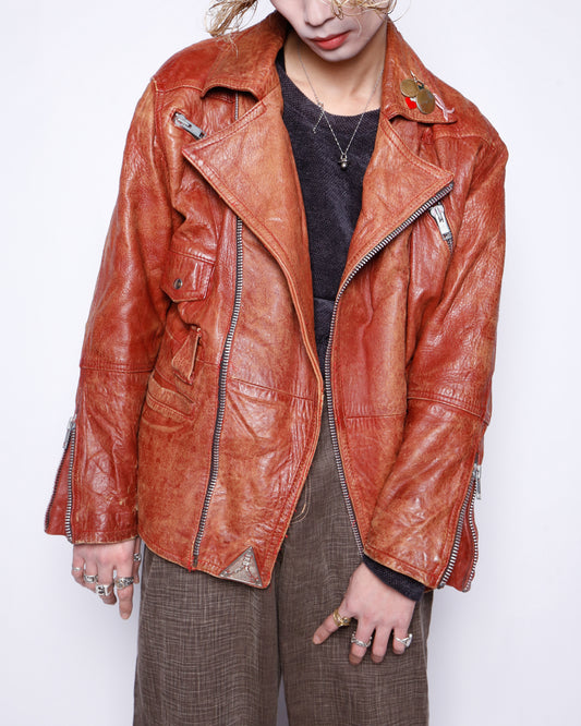 vintage reddish leather riders jacket , with badge