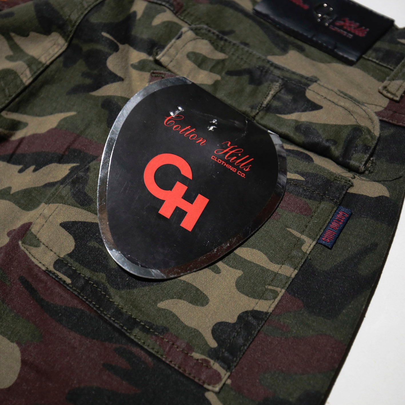 vintage broderie camo flare trousers